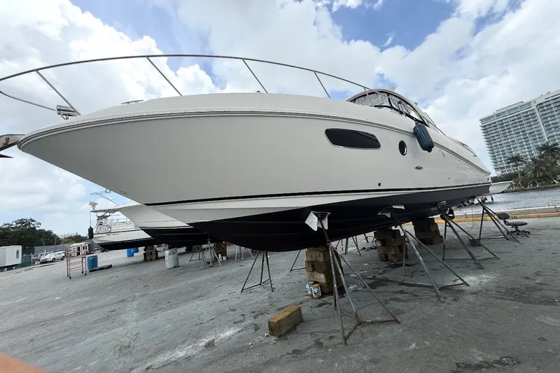 Slide: The Image of 2009 Sea Ray Sundancer 350 yacht on dry dock, ready for maintenance. - 48