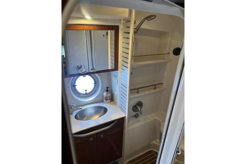 Slide: The Image of Bathroom interior of 2009 Sea Ray Sundancer 350 yacht with sink, mirror, and shower. - 45
