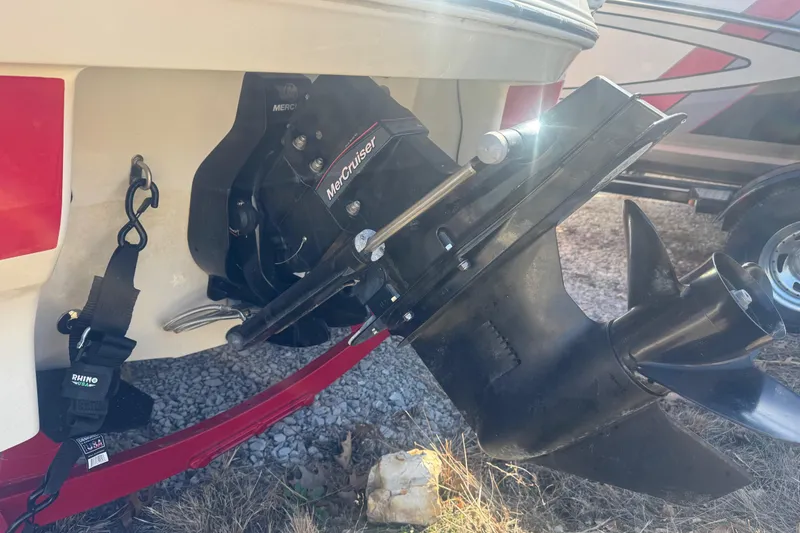 Slide: The Image of 2016 Tahoe 500 TF boat with MerCruiser engine, rear view showing propeller and trailer. - 5