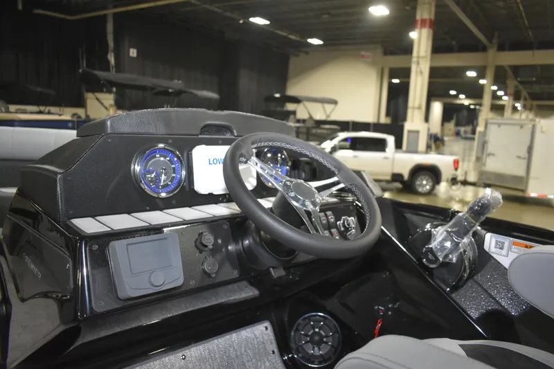 Slide: The Image of Interior view of 2026 Premier 230 Sunsation RL - PTX CL boat dashboard. - 12