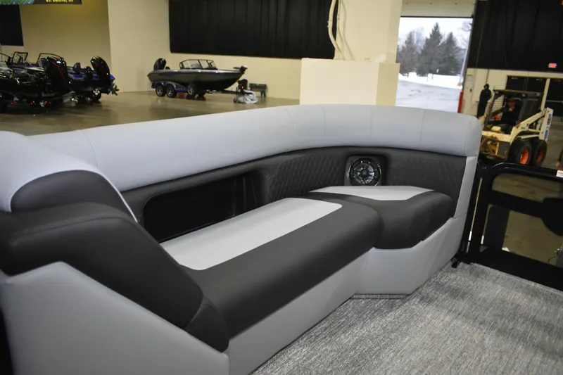 Slide: The Image of Luxurious seating in the 2026 Premier 230 SUNSATION RL - PTX CL boat interior. - 22