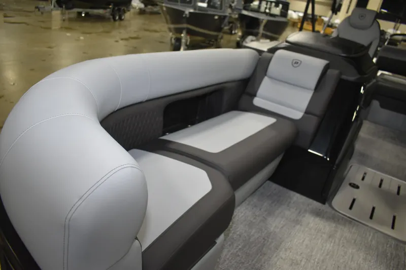 Slide: The Image of 2026 Premier 230 SUNSATION RL - PTX CL boat interior with luxurious seating. - 23