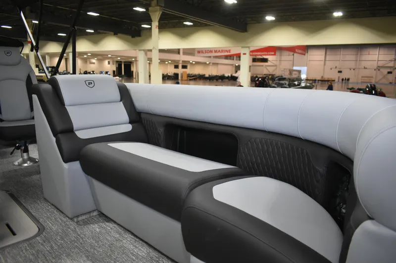 Slide: The Image of 2026 Premier 230 SUNSATION RL - PTX CL boat interior with luxurious seating. - 24