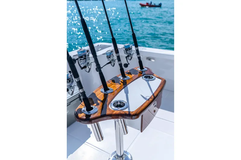 Slide: The Image of Fishing rods on Hammer Yachts 35HH, 2026 model, with ocean backdrop. - 34