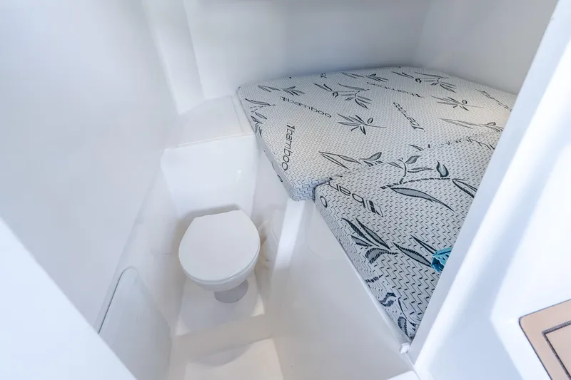 Slide: The Image of Compact cabin interior of 2026 Hammer Yachts 35HH with bed and toilet. - 38