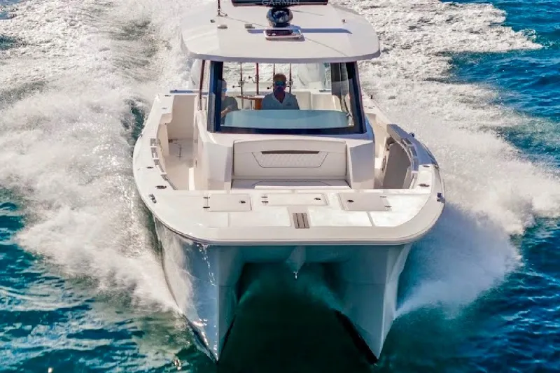Slide: The Image of 2026 Hammer Yachts 35HH cruising on open water, showcasing sleek design and performance. - 45