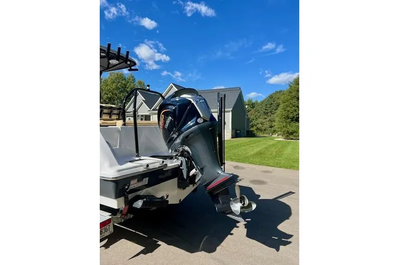 Slide: The Image of 2023 Sportsman Open 232 Center Console dashboard with steering wheel and navigation instruments. - 6