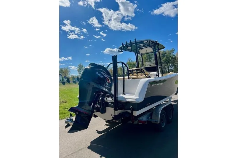 Slide: The Image of Garmin display on 2023 Sportsman Open 232 Center Console showing trip data and boat status. - 7