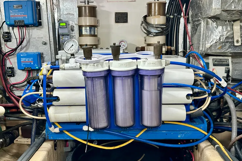 Slide: The Image of Engine room of 1988 Californian 45 Motor Yacht with water filtration system. - 44