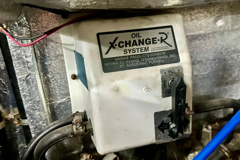 Slide: The Image of Oil X-Change-R system in 1988 Californian 45 Motor Yacht engine room. - 48