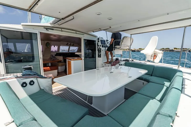 Slide: The Image of Spacious deck of 2012 Outremer 49 catamaran with seating and ocean view. - 10