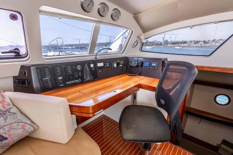 Slide: The Image of 2012 Outremer 49 yacht interior with navigation station and panoramic windows. - 14