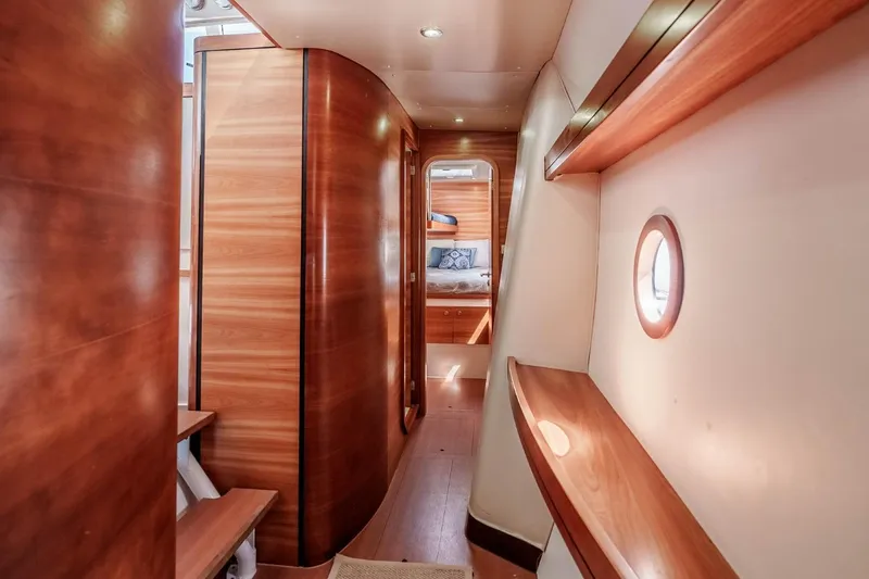 Slide: The Image of Luxurious interior of 2012 Outremer 49 yacht with elegant wood finishes and cozy cabin. - 29