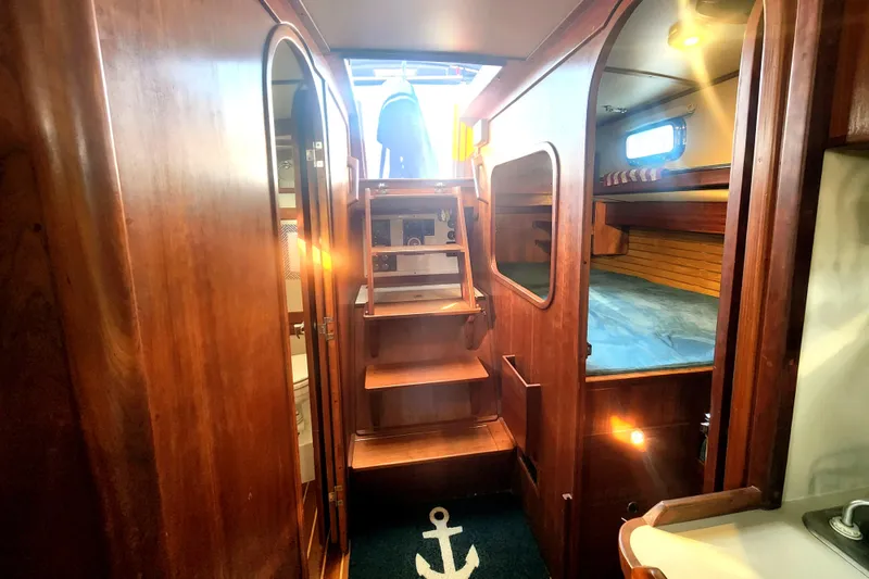 Slide: The Image of Valiant 42 CE/SE 2010 yacht interior with wooden finish and compact bathroom. - 11