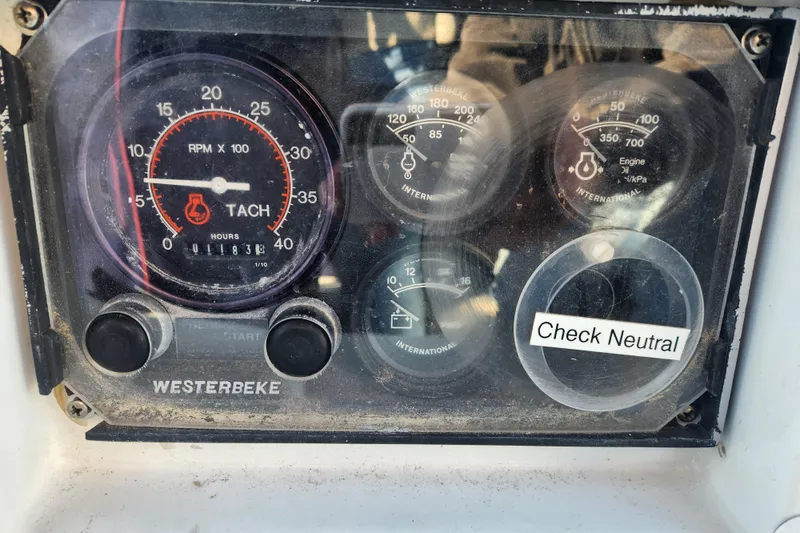 Slide: The Image of Cozy wooden cabin interior of 2010 Valiant 42 CE/SE sailboat with blue bedding. - 18