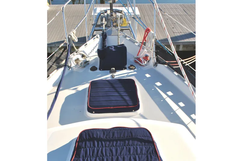Slide: The Image of Valiant 42 CE/SE 2010 sailboat on stands, named "Fidelity," with red hull and blue cover. - 4