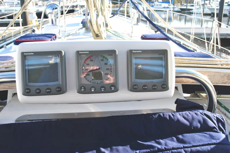 Slide: The Image of Interior of 2010 Valiant 42 CE/SE yacht with wooden cabinetry and modern amenities. - 9