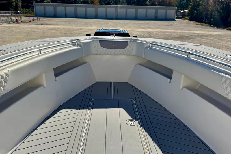 Slide: The Image of 2014 Invincible 36 Open Fisherman boat interior with spacious deck and seating. - 12