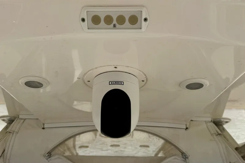 Slide: The Image of 2014 Invincible 36 Open Fisherman boat interior with mounted camera and lights. - 14