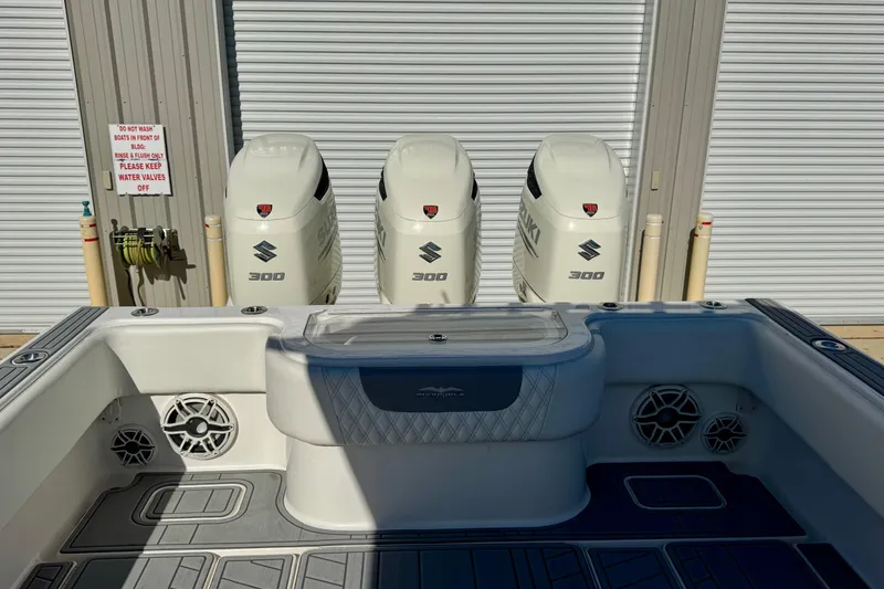 Slide: The Image of 2014 Invincible 36 Open Fisherman boat with triple Suzuki 300 engines. - 7