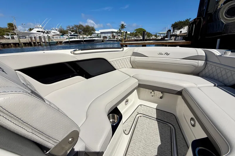 Slide: The Image of Luxurious interior of 2025 Sea Ray SLX 280 Outboard boat, featuring elegant seating and modern design. - 26