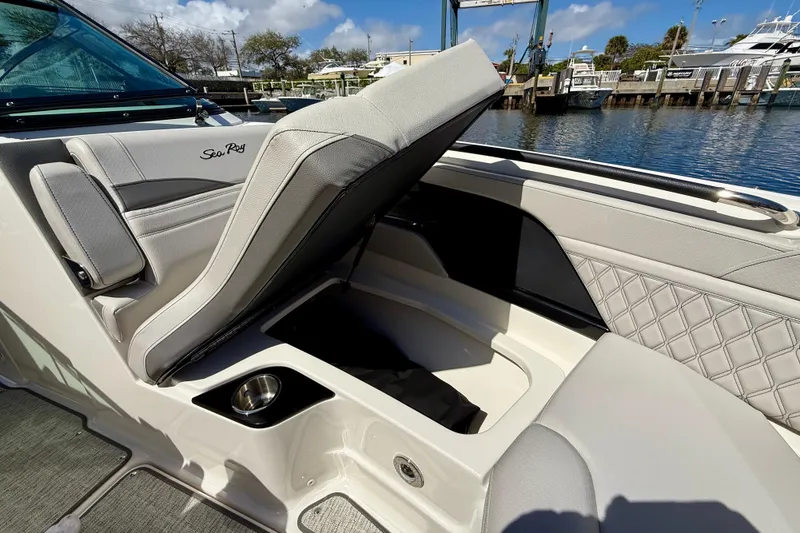 Slide: The Image of 2025 Sea Ray SLX 280 Outboard boat interior with open storage compartment. - 30