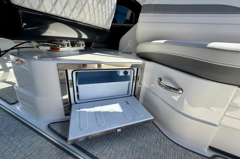 Slide: The Image of 2025 Sea Ray SLX 280 Outboard with open refrigerator. - 42