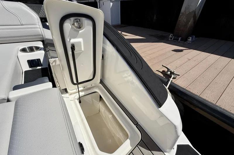 Slide: The Image of Storage compartment in Sea Ray SLX 280 Outboard 2025 boat. - 49