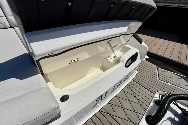 Slide: The Image of Storage compartment in Sea Ray SLX 280 Outboard 2025 boat. - 50