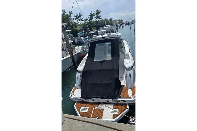 Slide: The Image of 2017 Monterey 360 Sport Coupe docked at marina with Raymarine equipment. - 13