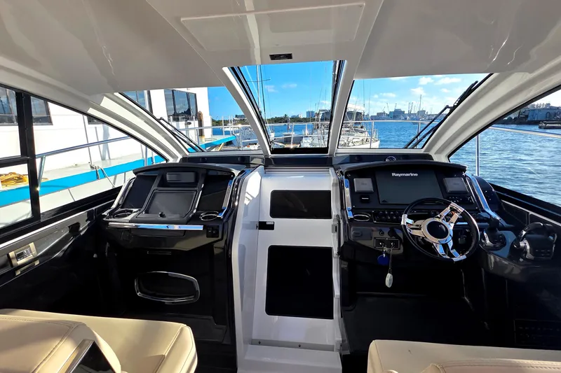 Slide: The Image of Interior view of 2017 Monterey 360 Sport Coupe yacht cockpit with modern navigation equipment. - 50