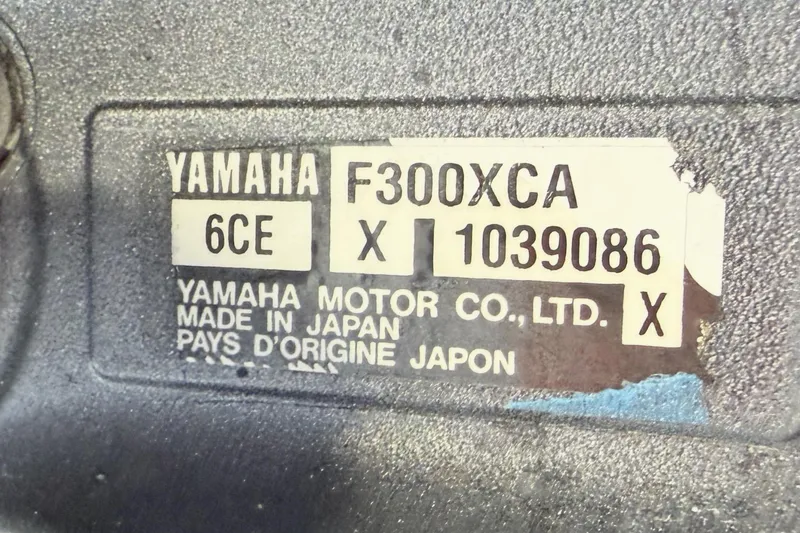 Slide: The Image of Yamaha F300XCA engine label on 2017 Pursuit DC 295 Dual Console boat. - 68