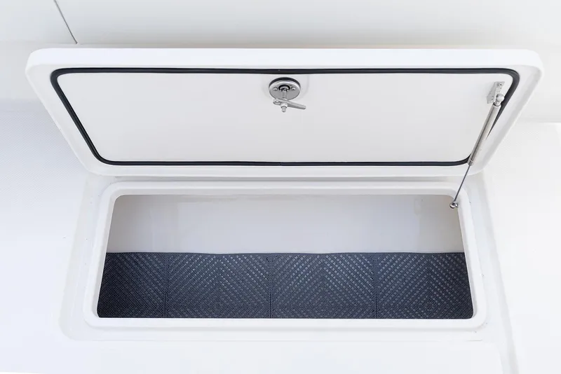 Slide: The Image of Open storage compartment on 2024 Invincible 33 Open Fisherman boat. - 32