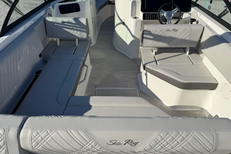 Slide: The Image of 2026 Sea Ray SDX 230 boat interior with luxurious seating and modern design. - 11