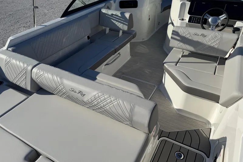 Slide: The Image of 2026 Sea Ray SDX 230 boat interior with luxurious seating and modern design. - 12