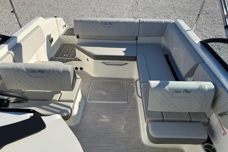 Slide: The Image of 2026 Sea Ray SDX 230 boat interior with luxurious seating and modern design. - 13