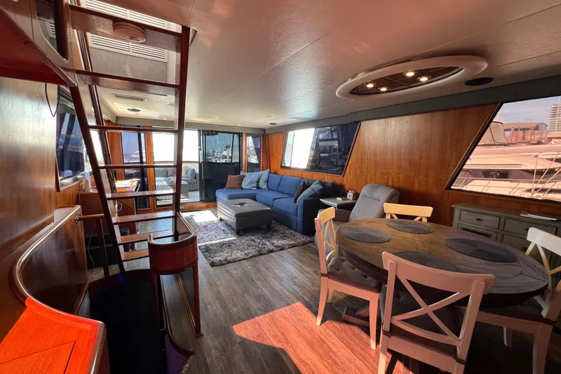 Slide: The Image of Flybridge TV above stairs down to salon - 17