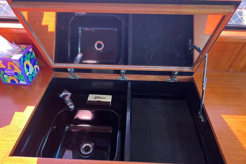 Slide: The Image of Wet Bar with marina view through window. - 27