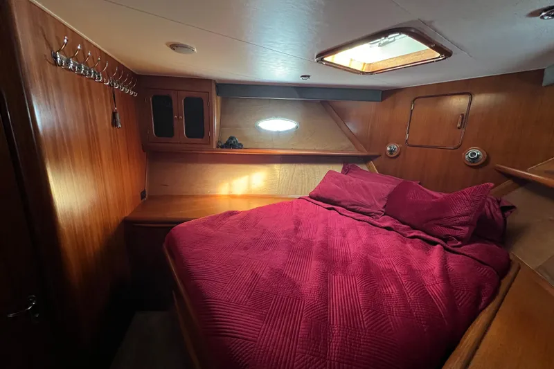 Slide: The Image of Cozy V-Berth forward wood accents. - 40