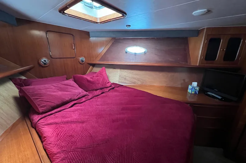 Slide: The Image of Guest Queen forward with wood accents. - 41