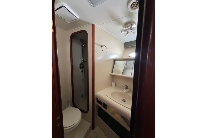 Slide: The Image of Queen berth, overhead hatch and port windows. Access to chain locker - 42