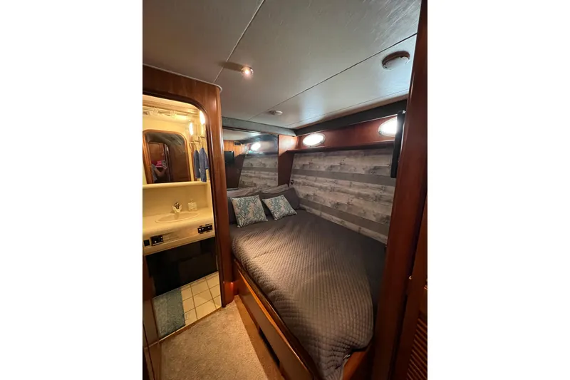 Slide: The Image of Twin bunk room to PStarboard with shared shower/head - 44