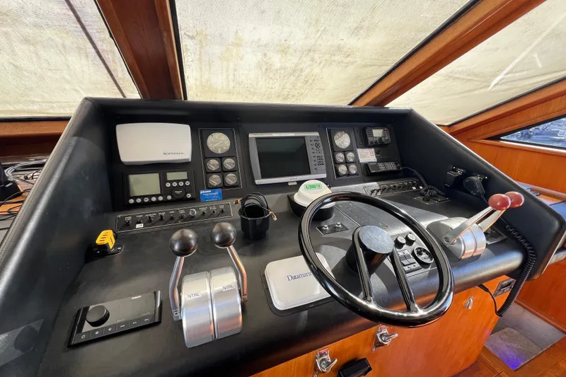 Slide: The Image of Interior of 1991 Viking 63 Motor Yacht with cozy cabin and bathroom. - 46