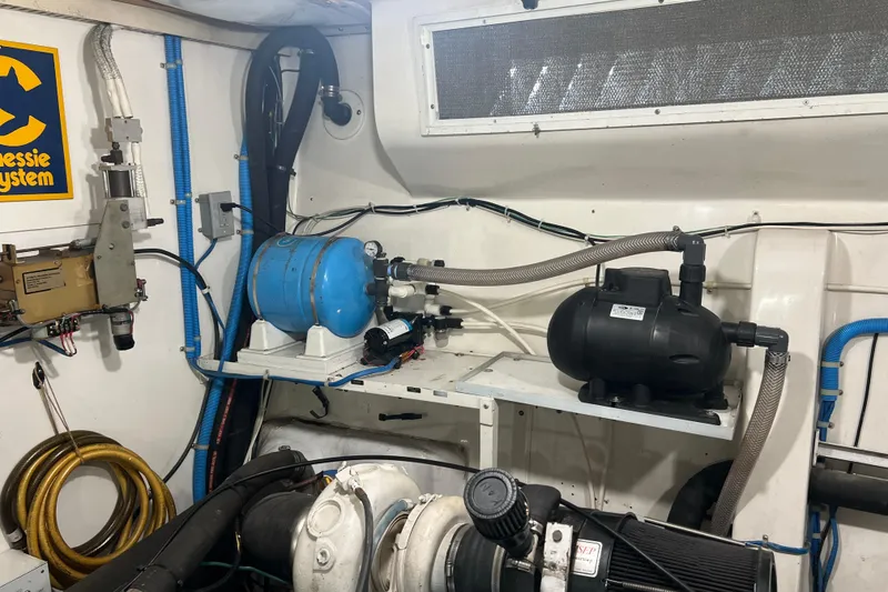 Slide: The Image of Newer 30 gal water heater and piping. - 62