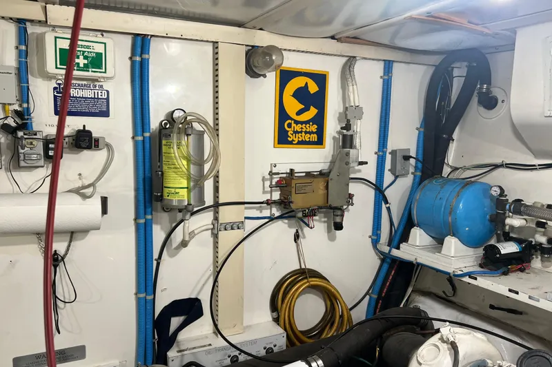 Slide: The Image of Luxurious interior of 1991 Viking 63 Motor Yacht with modern furnishings and wooden accents. - 65