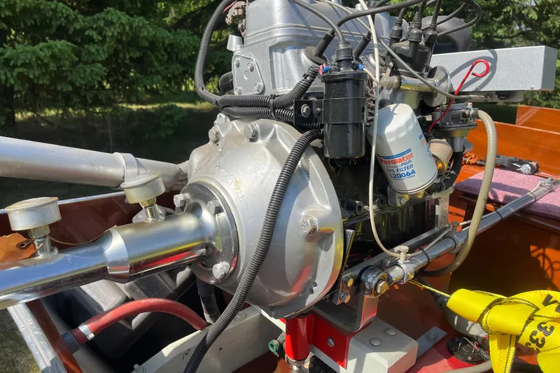 Slide: The Image of Close-up of a 1990 Utility Series Thai Longboat engine with visible oil filter. - 7