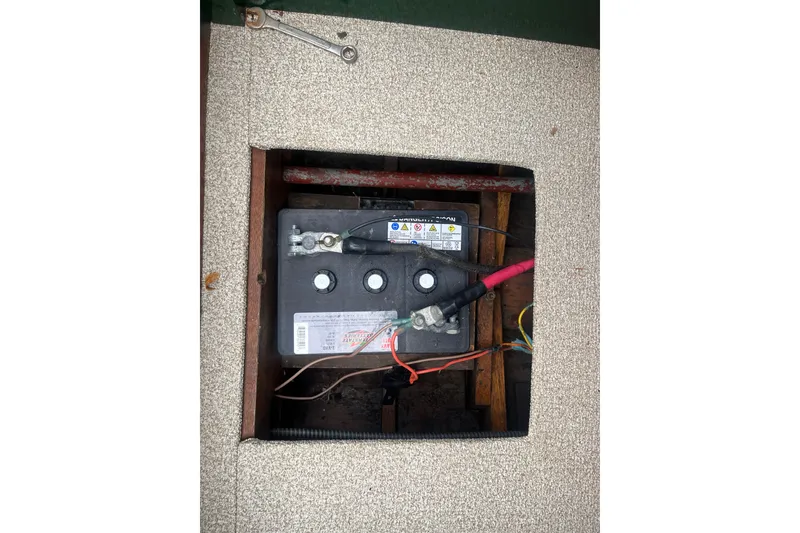 Slide: The Image of Battery compartment of a 1955 Chris-Craft 17 Sportsman boat. - 11