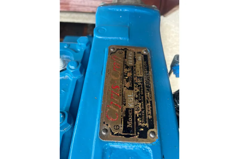 Slide: The Image of 1955 Chris-Craft 17 Sportsman engine with identification plate, blue color. - 14