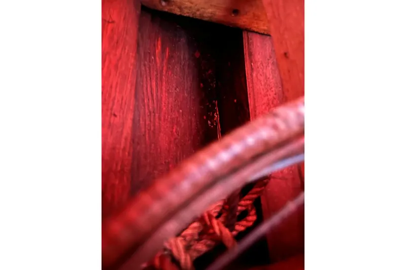 Slide: The Image of Close-up of 1958 Chris-Craft 16 Cavalier's wooden interior with rope detail. - 12