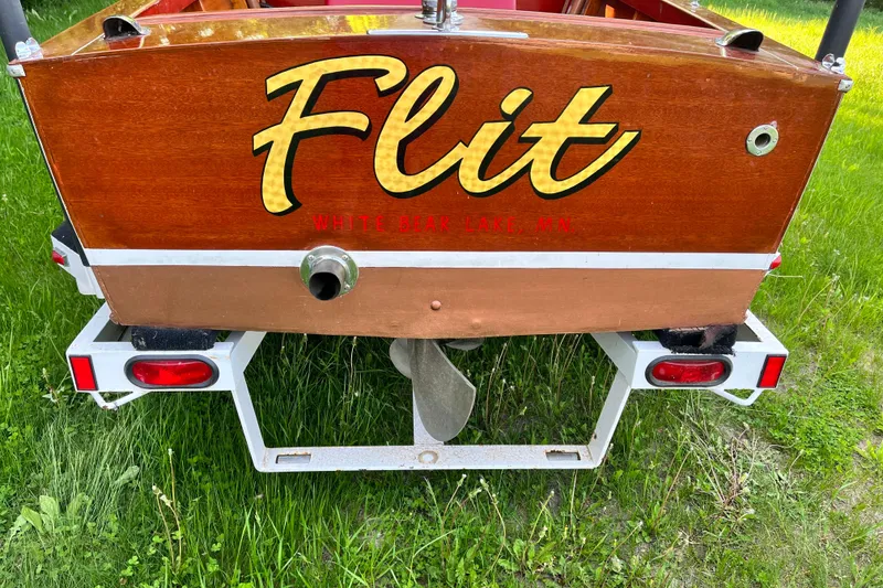 Slide: The Image of 1958 Chris-Craft 16 Cavalier boat named "Flit" on trailer, White Bear Lake, MN. - 4